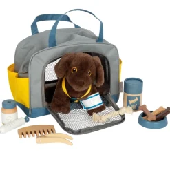 Perro con bolsa de transporte y set de cuidados - Small foot company